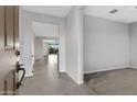 View down the entry hall into the living room area at 19137 W Jackson St, Buckeye, AZ 85326