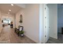 Bright entry hallway with wood-look floors and bench at 2408 N Morrison Ave, Casa Grande, AZ 85122