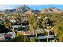 Aerial view of a neighborhood with mountain views and many houses at 2423 E Marshall Ave, Phoenix, AZ 85016