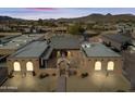 Aerial view of a sprawling ranch-style home with mountain views at 37209 N 12Th St, Phoenix, AZ 85086