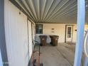 Side view of the mobile home's covered patio at 3721 N Illinois Ave, Florence, AZ 85132