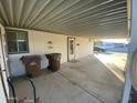 Covered patio with access to the home and yard at 3721 N Illinois Ave, Florence, AZ 85132