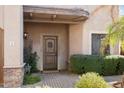 Elegant entryway with wood door and brick walkway at 4430 N 22Nd St # 1, Phoenix, AZ 85016