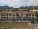 Upscale community, featuring multiple buildings with Spanish-style architecture and mountain views at 7275 N Scottsdale Rd # 1001, Paradise Valley, AZ 85253