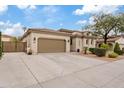 Two-story house with a large driveway and gated entrance at 7846 W Adam Ave, Peoria, AZ 85382