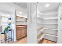 Well-organized pantry with ample shelving for storage at 7940 E Camelback Rd # 506, Scottsdale, AZ 85251