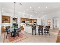 Spacious kitchen boasts an island, ample cabinetry, and stainless steel appliances at 10756 E Ludlow Dr, Scottsdale, AZ 85255