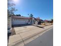 Single-story home with a two-car garage and desert landscaping at 15829 N 12Th St, Phoenix, AZ 85022