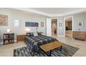 Bright bedroom with a comfortable bed and built in shelving at 2211 E Camelback Rd # 201, Phoenix, AZ 85016