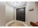 Elegant entryway with double doors and tile flooring at 2211 E Camelback Rd # 201, Phoenix, AZ 85016