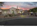 Stunning desert home with attractive landscaping and three-car garage at 32029 N 19Th Ln, Phoenix, AZ 85085