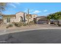 Single-story home with stucco exterior, tile roof, and landscaped front yard at 32029 N 19Th Ln, Phoenix, AZ 85085