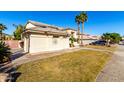 House exterior showcasing a side view and landscaping at 5748 W Soft Wind Dr, Glendale, AZ 85310