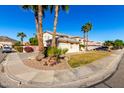 Two-story house with a landscaped yard and driveway at 5748 W Soft Wind Dr, Glendale, AZ 85310