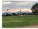 Scenic sunset view overlooking a peaceful golf course at 10161 W Pineaire Dr, Sun City, AZ 85351