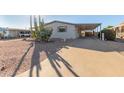 Driveway and front entrance of manufactured home at 1126 S 97Th Way, Mesa, AZ 85208