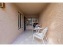 Small patio with table and chairs, great for relaxing at 14300 W Bell Rd # 5, Surprise, AZ 85374