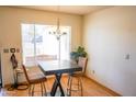 Bright dining area with a small table and chairs at 2300 W Temple St, Chandler, AZ 85224