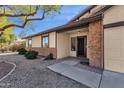 Inviting front entrance with brick facade and a screen door at 2647 E Evergreen St, Mesa, AZ 85213