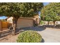 House exterior showcasing garage and landscaping at 31032 N Obsidian Dr, San Tan Valley, AZ 85143