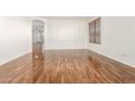 Bright living room with hardwood floors and an open floor plan at 31032 N Obsidian Dr, San Tan Valley, AZ 85143