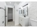 Modern bathroom with white vanity and updated fixtures at 4608 W Maryland Ave # 125, Glendale, AZ 85301