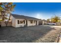 Single story home with a newly paved driveway and updated landscaping at 5315 W Christy Dr, Glendale, AZ 85304