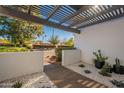 Pathway to the front door with white rock and cacti at 8018 N 3Rd Pl, Phoenix, AZ 85020