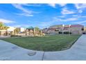 Community green space with gazebos and a paved walkway at 1015 S Val Vista Dr # 87, Mesa, AZ 85204