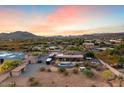 Stunning aerial view of a home with a pool and desert landscape at 103 W Tanya Rd, Phoenix, AZ 85086