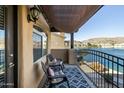 Lakefront balcony with seating and mountain views at 16410 S 12Th St # 206, Phoenix, AZ 85048