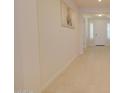 Light-filled entryway with tile floor and large artwork at 2508 N Franz Ln, Casa Grande, AZ 85122