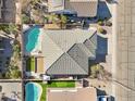 Home's roofline, pool, and backyard are visible from above at 3519 E Red Oak Ln, Gilbert, AZ 85297