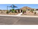 Community playground with play structure, shaded seating, and desert landscaping at 4232 W Hannah St, San Tan Valley, AZ 85144