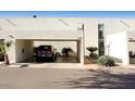 Private carport with space for one vehicle and lush landscaping at 4666 N 40Th St, Phoenix, AZ 85018