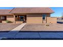 Front entrance of a tan stucco building with walkway at 501 W Yukon Dr # 8, Phoenix, AZ 85027