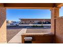 View from entryway of carport and parking lot at 501 W Yukon Dr # 8, Phoenix, AZ 85027