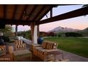 Relaxing patio with mountain views and comfortable seating at 7348 N Red Ledge Dr, Paradise Valley, AZ 85253