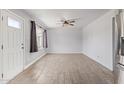 Bright living room with tile floors and ceiling fan at 2101 N Normal Ave, Tempe, AZ 85288
