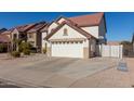 Two-story house with a large garage and gated driveway at 2442 E Winged Foot Dr, Chandler, AZ 85249