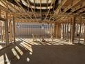 Interior framing of a house under construction with plumbing and HVAC visible at 47747 W Moeller Rd, Maricopa, AZ 85139