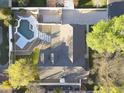 An overhead view of a home featuring a private pool, patio and landscaped yard at 8366 S Grandview Ave, Tempe, AZ 85284