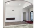 Living room features a linear fireplace and hardwood floors at 14371 W Morning Star Trl, Surprise, AZ 85374