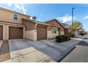 Charming home exterior featuring a well-maintained yard and an attached two-car garage at 1921 E Lantana Dr, Chandler, AZ 85286