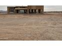 New home construction in progress, showcasing the frame of a house at 23197 W Skinner Rd, Wittmann, AZ 85361