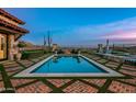 Stunning pool and patio area with mountain views at 42638 N Chiricahua Pass, Scottsdale, AZ 85262