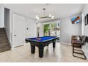 Game room with pool table and access to backyard at 6850 E Mcdowell Rd # 72, Scottsdale, AZ 85257