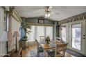 Bright dining area with a table and chairs, overlooking the backyard at 7750 E Broadway Rd # 770, Mesa, AZ 85208