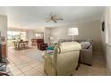 Bright and airy living room with tiled floors and comfortable seating at 12923 W Ballad Dr, Sun City West, AZ 85375