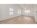 Light-filled dining area with hardwood floors and a stylish table at 1326 W Seascape Dr, Gilbert, AZ 85233